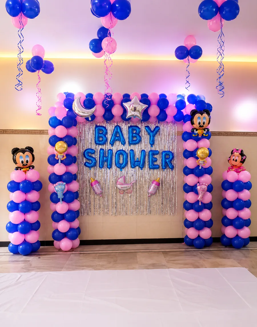 Pink & Blue Baby Shower Balloon Decoration with Silver Fringe Backdrop